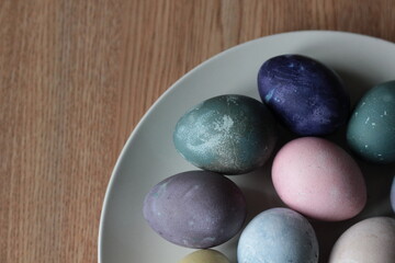 Fototapeta na wymiar Homemade colorful naturally dyed Easter eggs