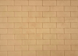 Obraz premium Yellow brick wall background outdoor decoration