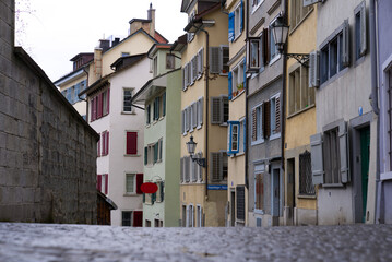 Beautiful colorful facades of historic houses at medieval old town of Zürich on a winter day. Photo taken February 1st, 2022, Zurich, Switzerland.