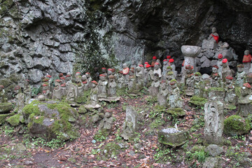 statues of jizo and buddhist (?) divinities at tachikue in japan 