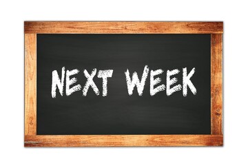 Obraz premium NEXT WEEK text written on wooden frame school blackboard.