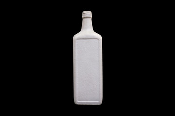 white bottle of gypsum isolated on a black background