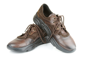 Pair of classic brown leather shoes isolated on white