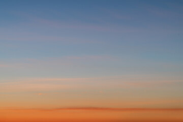 Sky gradient from blue to orange sunset