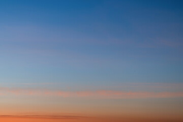 Sky gradient from blue to orange sunset