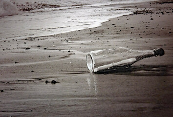 Mysterious message in a Bottle on the North Sea beach of Sankt Peter -Ording