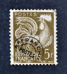 Cancelled postage stamp printed by France, that shows Cock, circa 1957.