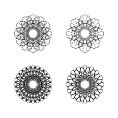 Set of four ethnic round mandala ornaments isolated on white background. Vector illustration. Geometric flower.