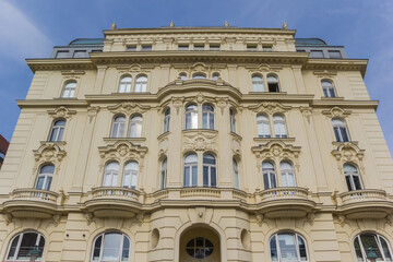 Front facade of a historic building in Vienna, Austria