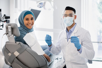 Root Canal Treatment.. Stomatologist In Medical Mask Having Checkup With Female Patient