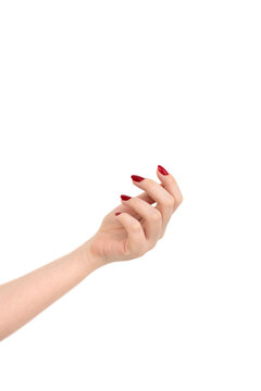 Beautiful female hand with red manicure nails isolated