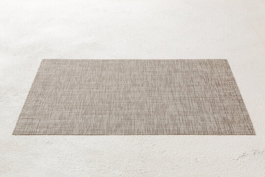 Perspective view of grey tablecloth for food on cement background. Empty space for your design