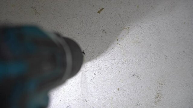 Drilling a hole in hard sand and cement morat bedding joint