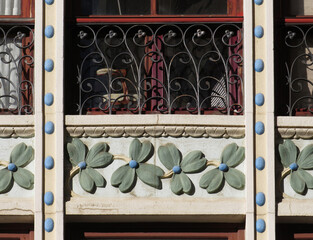 Detail of Revival colorful decoration with clovers of a building in the historic city center of Zamora. Spain.