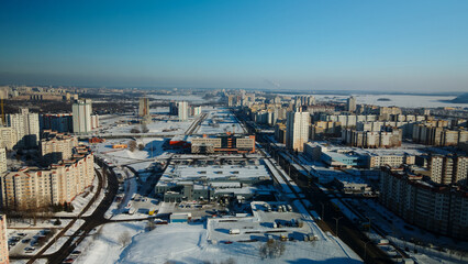 Obraz premium City block. Modern multi-storey buildings. Winter cityscape. Aerial photography.