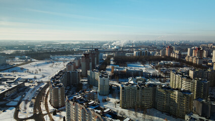 Fototapeta premium City block. Modern multi-storey buildings. Winter cityscape. Aerial photography.