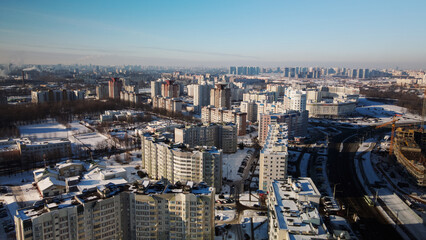 City block. Modern multi-storey buildings. Winter cityscape. Aerial photography.