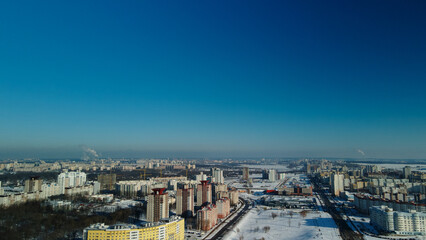 City block. Modern multi-storey buildings. Winter cityscape. Aerial photography.