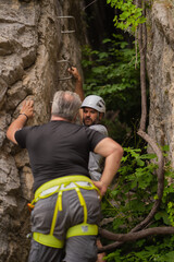 Two seniors talking about the climbing