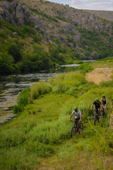 Group of friends are riding in one single line