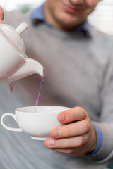 Sipping some tea, close up