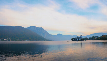 lake Traunsee and Orth castle, surrounded by mountains