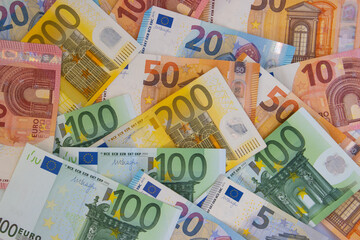 Obraz na płótnie Canvas Flat lay of euro bills banknote for financial background