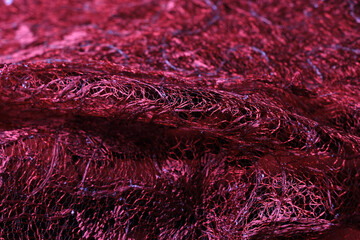 maroon brocade tiles and soft fabric. cloth to make a typical Indonesian kebaya. Javanese traditional wedding dress