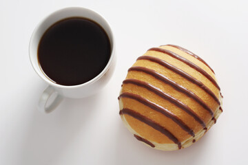 Coffee and donut with chocolate