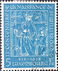 Luxembourg - circa 1958: a postage stamp from Luxembourg, showing a painting in memory of St Willibrord