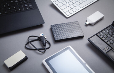 Modern digital devices for the transfer and storage of information.