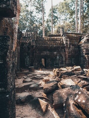 Ruins of an ancient stone temple lost in the Cambodian jungle - Ta Nei of Angkor temples