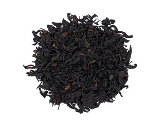 Black tea large-leaf dry on a white background. Dry black tea top view.