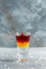 layered shot cocktails at the bar. alcoholic cocktail drink shot