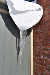 Snow and Icicle on a Building