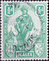 Malta - circa 1922: a postage stamp from Malta , showing the Melita - Allegory of Malta. With robe, Maltese cross and coat of arms.