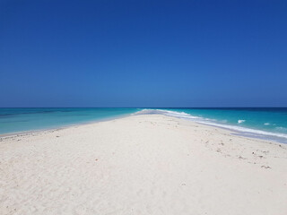 Beautiful Sand Island surrounded with an ocean in Zanzibar Tanzania 