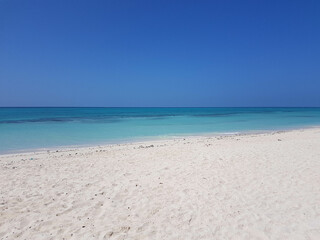 Fototapeta na wymiar Beautiful Sand Island surrounded with an ocean in Zanzibar Tanzania 