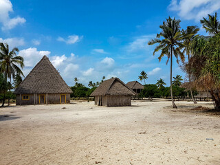 Fototapeta na wymiar Bungalows houses on Zanzibar Tanzania paradise beach 