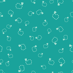Green Rosary beads religion icon isolated seamless pattern on green background. Vector