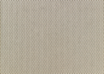 Dots background. Speaker cover plate. Metal plate with holes. Dots wallpaper.