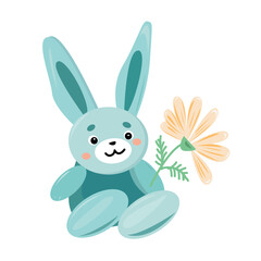 The bunny is sitting and holding a flower.