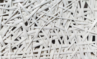 White weaving pattern background in macro style. Weaving texture classic design background. Bamboo weaving chair texture.