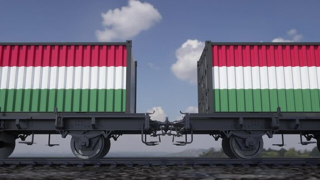 Containers with the flag of Hungary. Railway transportation