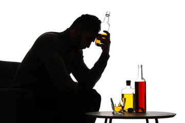 Silhouette of addicted man with alcoholic drinks on white background