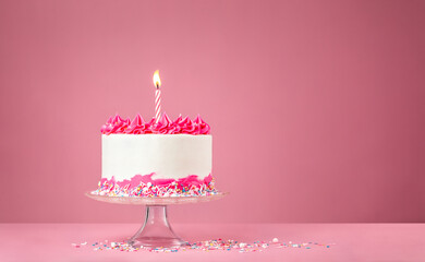 Pink Birthday Cake with Candle on pink background - 484988939