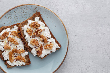 Sandwich with philadelphia and walnuts. Healthy nutritious paleo keto breakfast concept.