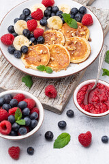 Keto diet pancakes made or almond flour, served with berries.