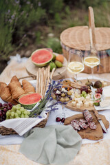 Close-up of food on the open diaphragm of food Summer season.Lavender fields. Picnic in the Countryside.