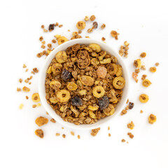 crunchy granola in bowl isolated on white background